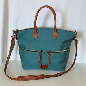 Think Spring with this gorgeous Dooney & Bourke Nylon Large Pocket Satchel! 💐